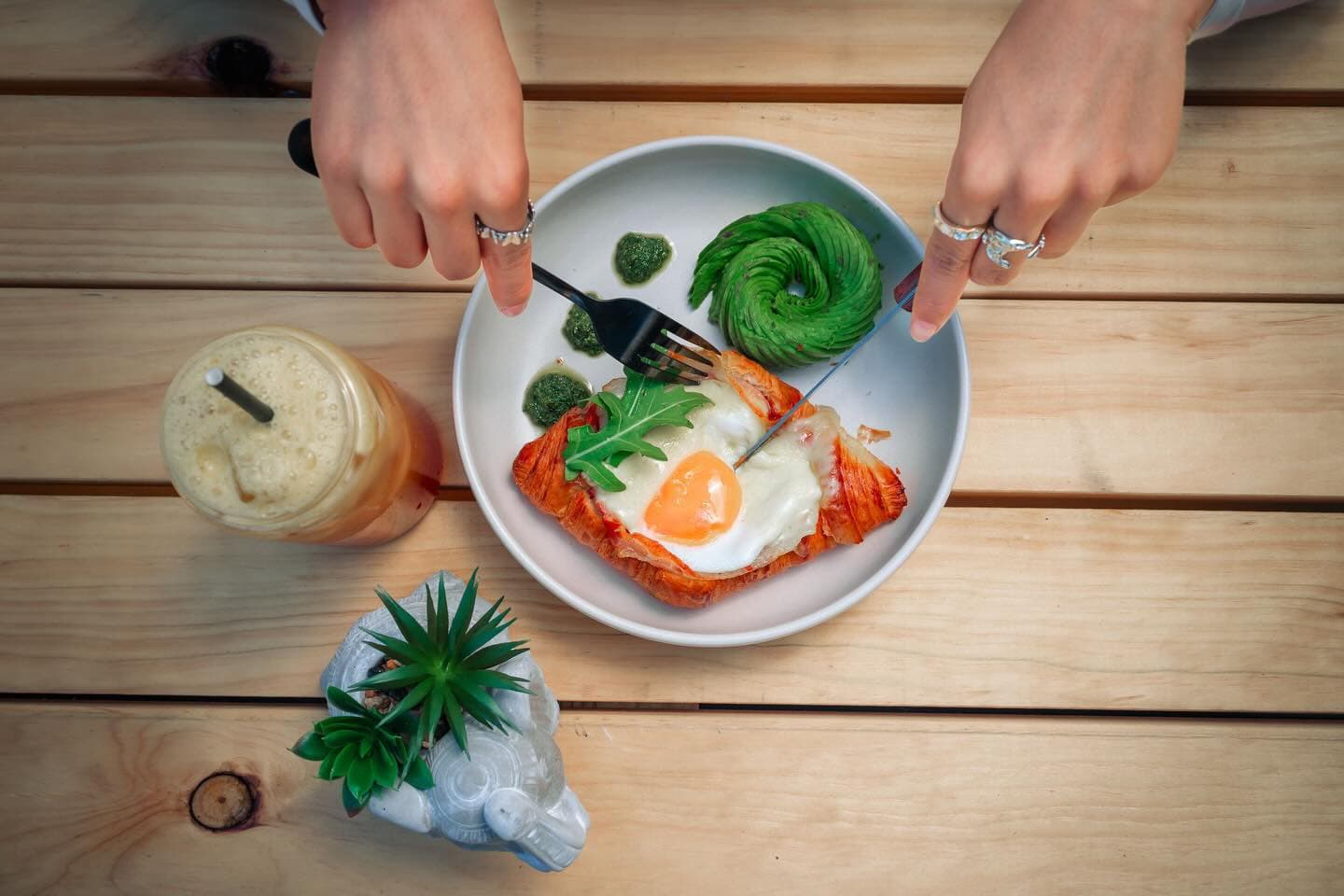 Ella open croissant with egg and avocado